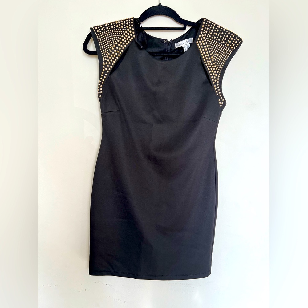 Sans souci Black dress with Gold embellishments. Gently used. Size Medium